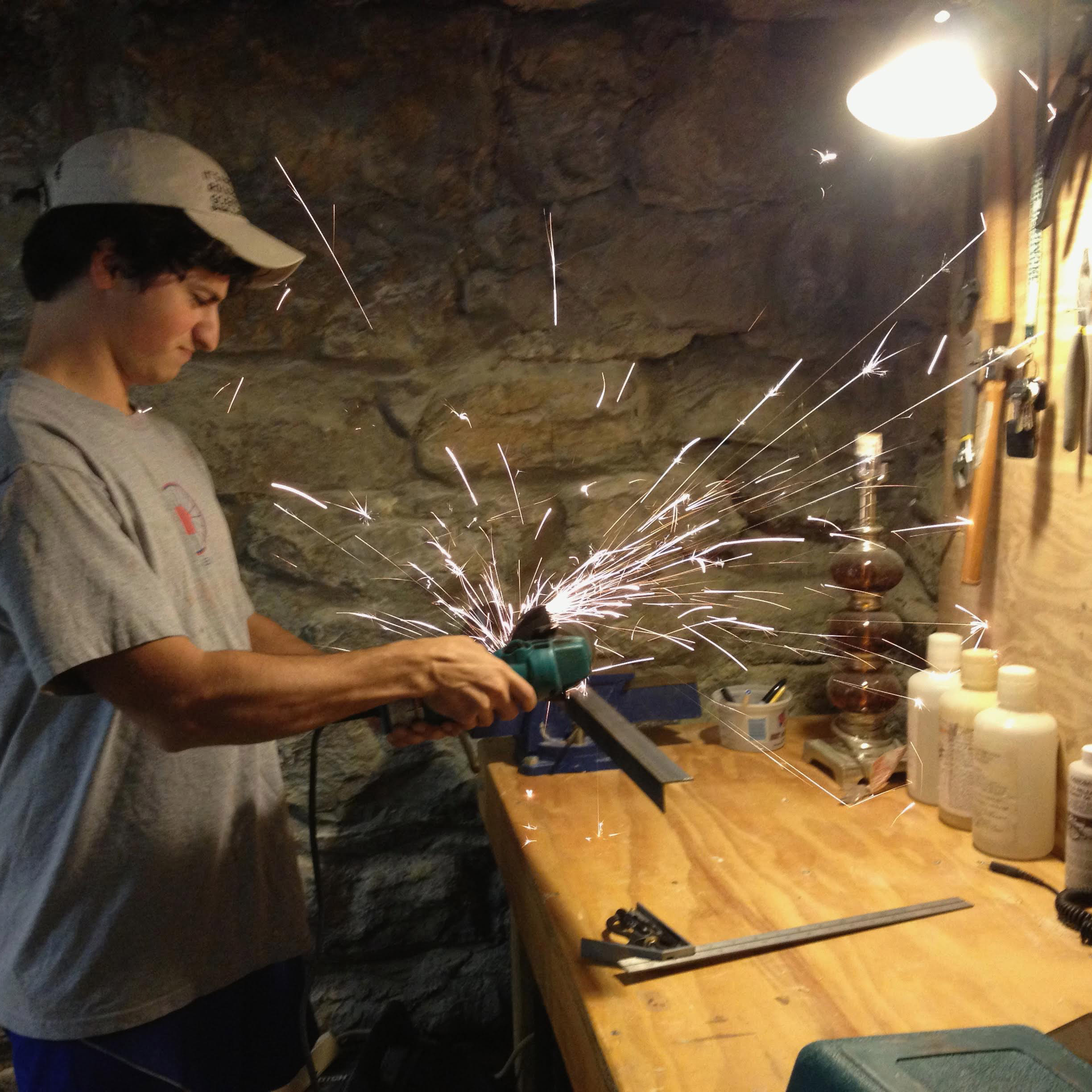 austin cutting metal with a grinder